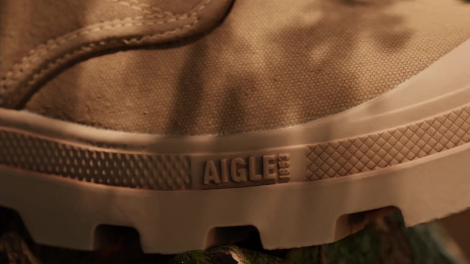 Cleated sole and Aigle logo in close-up, 3D model from the scan
