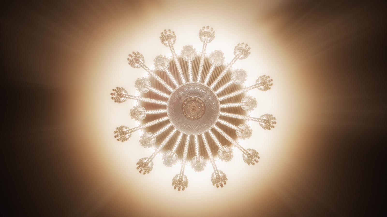 Baccarat Zenith chandelier seen from below, halo of light, CGI film still